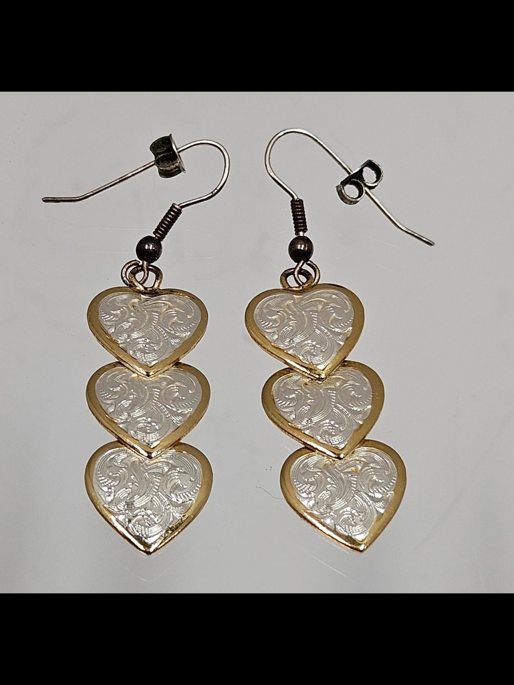 Montana Silversmiths Gold and Silver Triple Heart Dangle Earrings